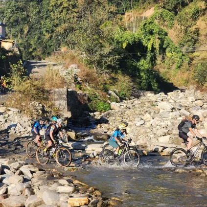Crossing the River in Mountain Bike
