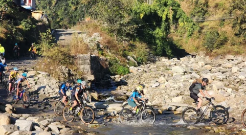 Crossing the River in Mountain Bike